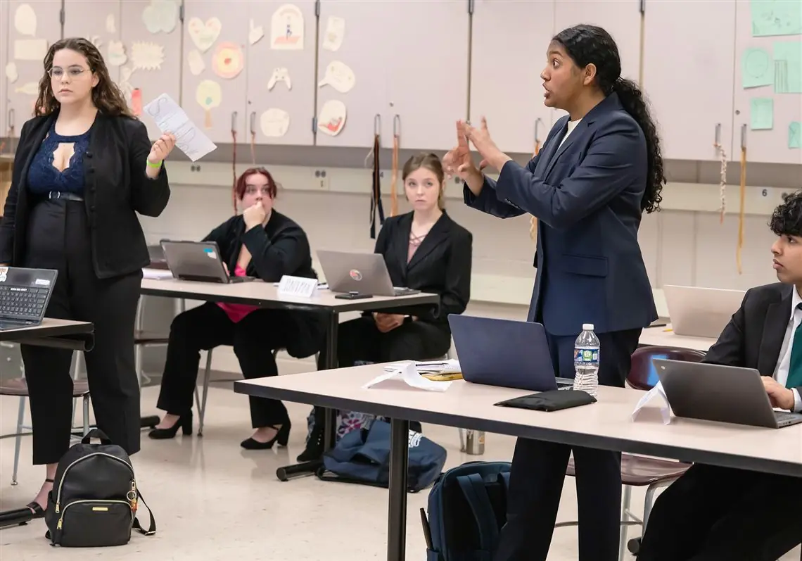 A debate round in progress in a classroom